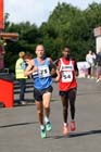 Ian Hudspith (Morpeth) and Tadele Geremew (Elswick)  during the Tyne Bridge Harriers Exhibition Park 5k, Newcastle.